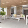 Covered outdoor lounge terrace at a Santa Clara apartment, Marbella