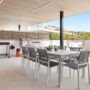 Outdoor dining table and barbecue at a Santa Clara apartment, Marbella
